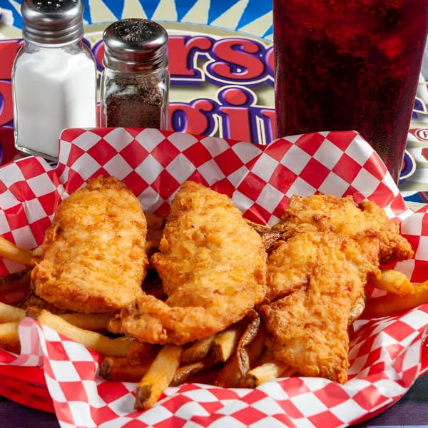 Emerson Biggins' fried chicken tenders and fries in a red checkered basket with a drink.